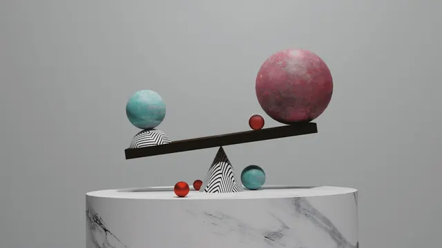 A balance with two spheres of different size