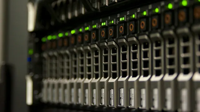 A server rack with rows of green status lights